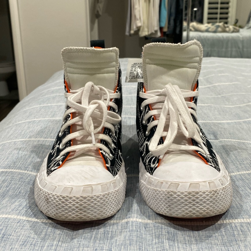 “Converse UNT1TL3D High Top”
